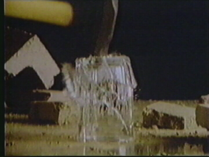 Newton’s First Law: Rest Inertia of Bursting Water Balloon Shattering Flask and Concrete Block